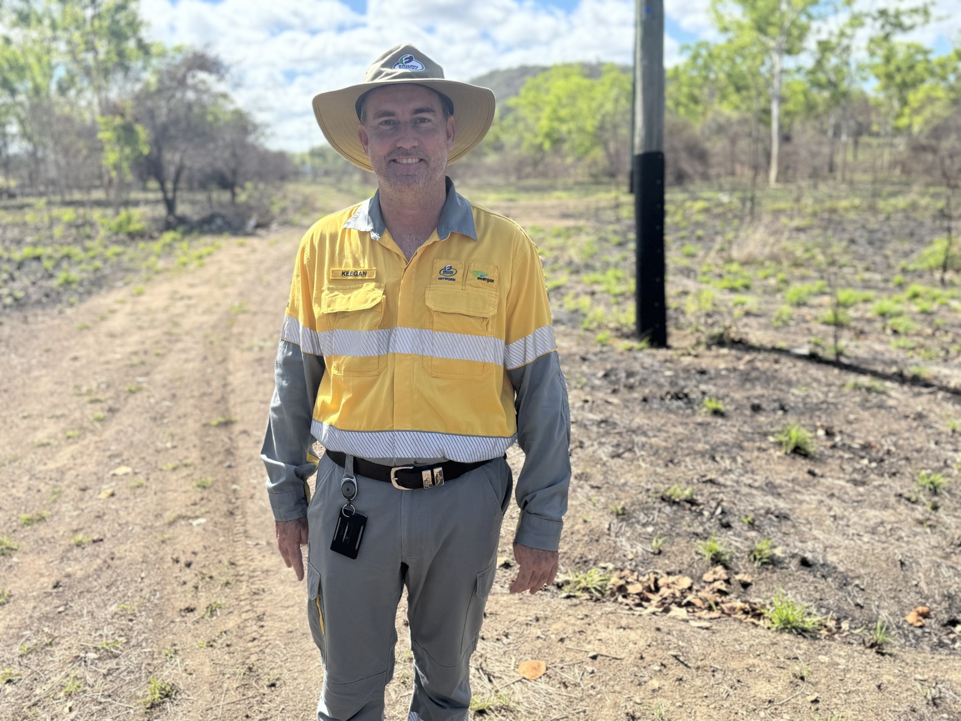 Network manager Keegan Oliver with fireproof power poles