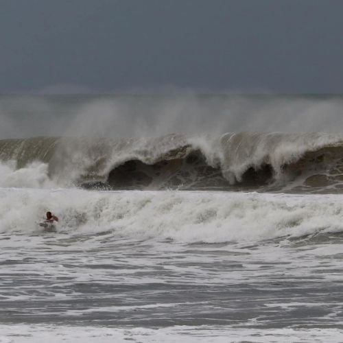 Big swell at Maroochydore with body boarder